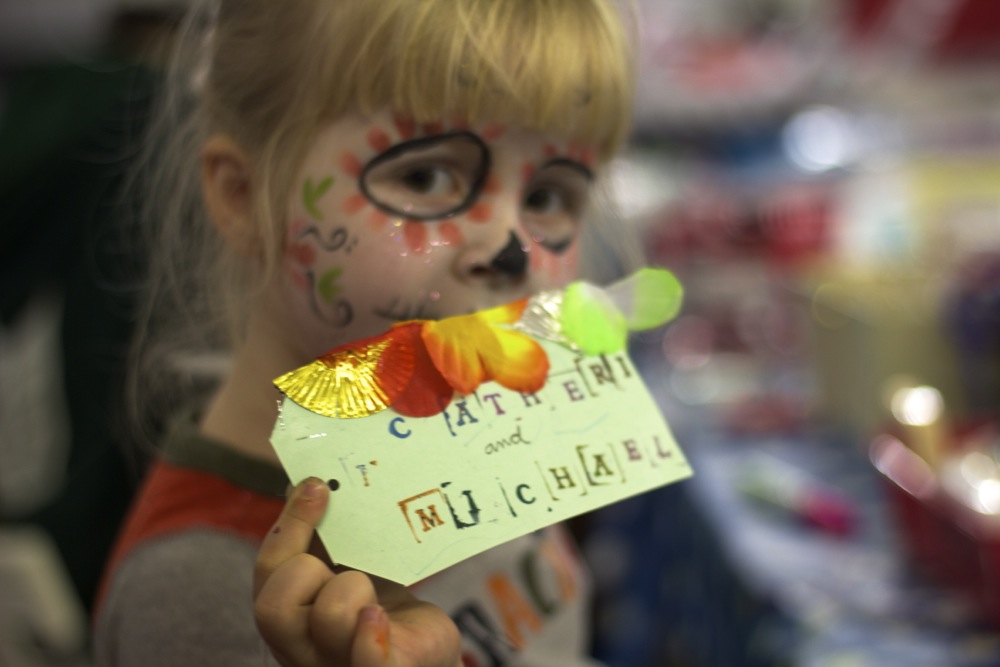 face painted girl with shrine tag